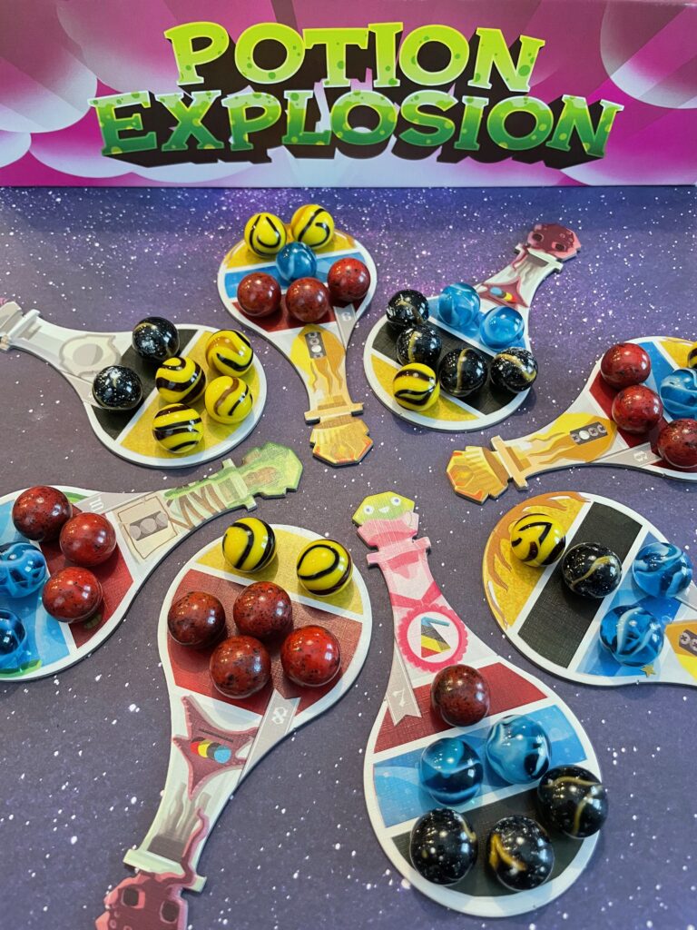 Potion Explosion Cards setup with the new thematic marbles.